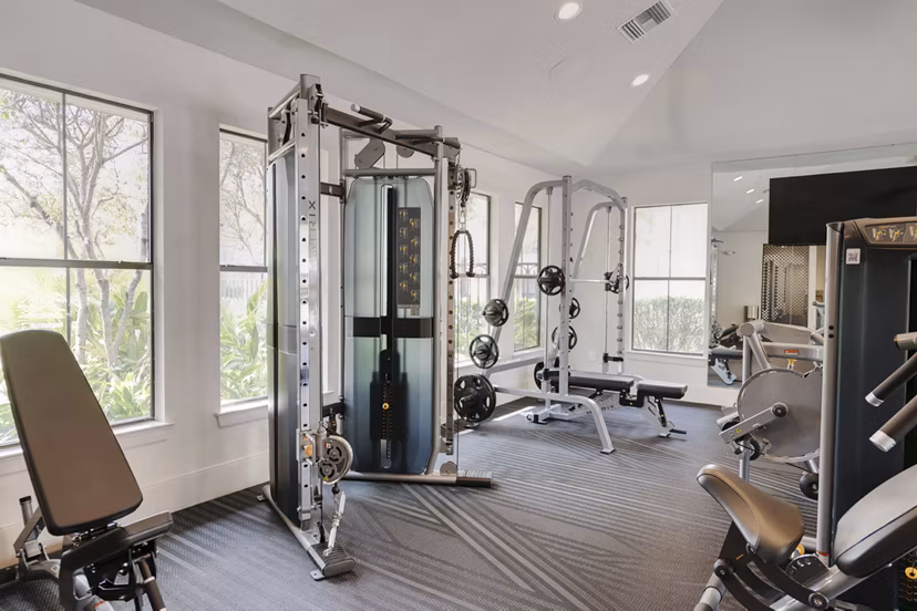 fitness center at Duo West Champions Apartments 