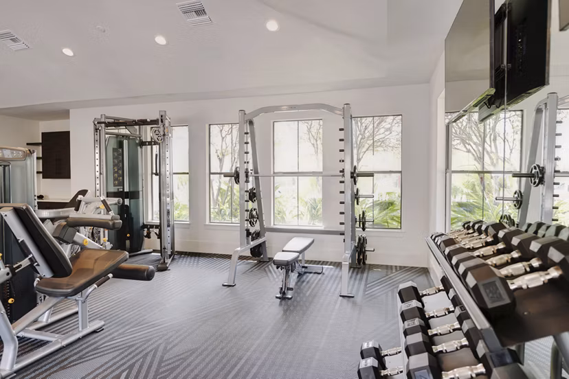fitness center at Duo West Champions Apartments 