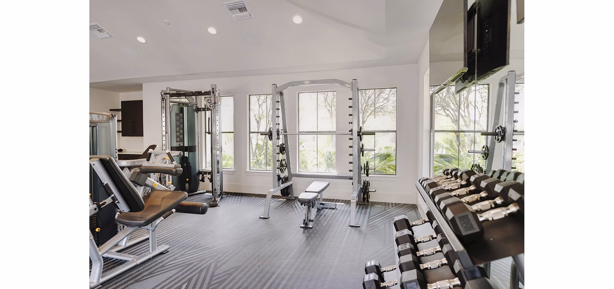 fitness center at Duo West Champions Apartments 