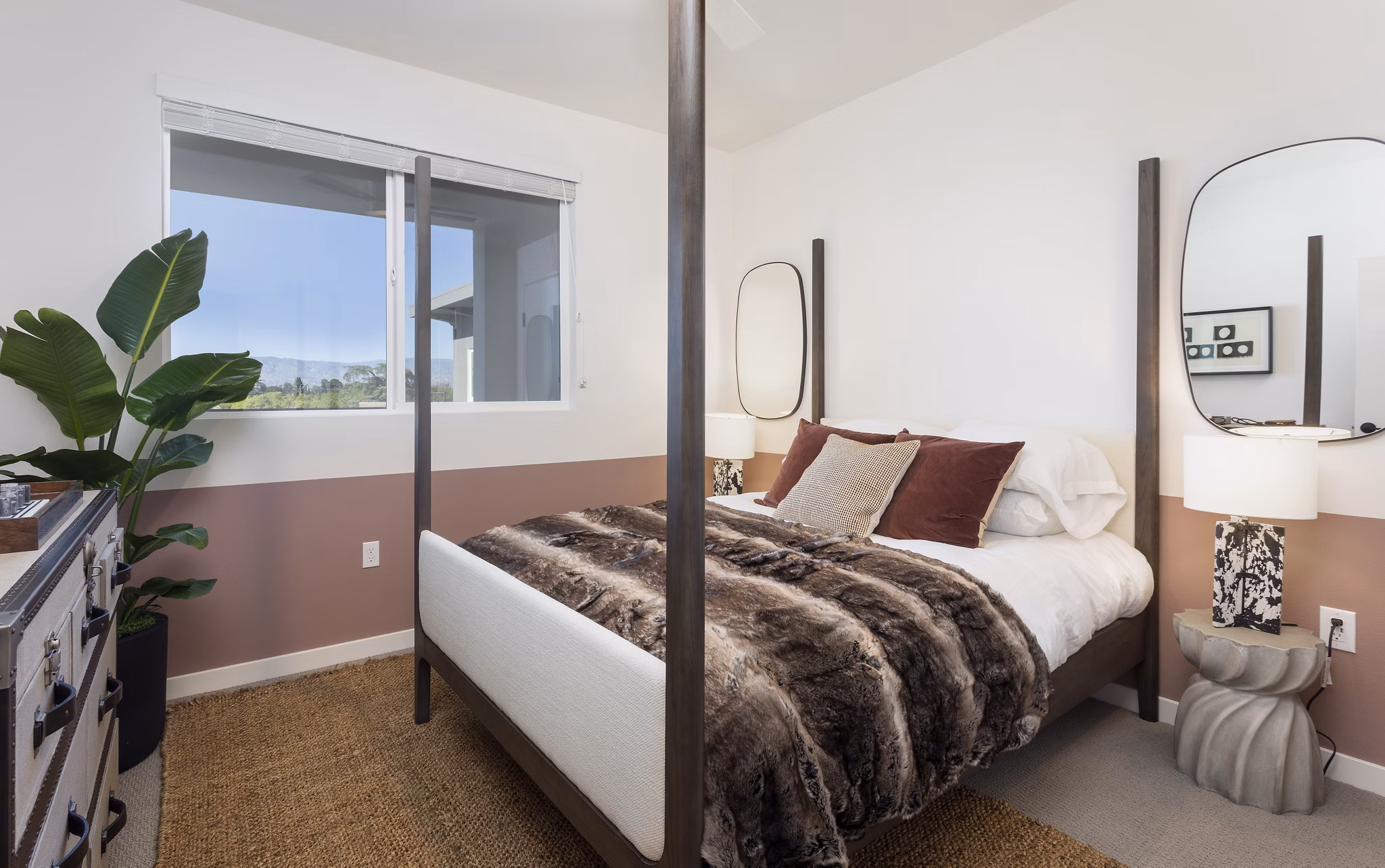 bedroom at Alexan NoHo West Apartments