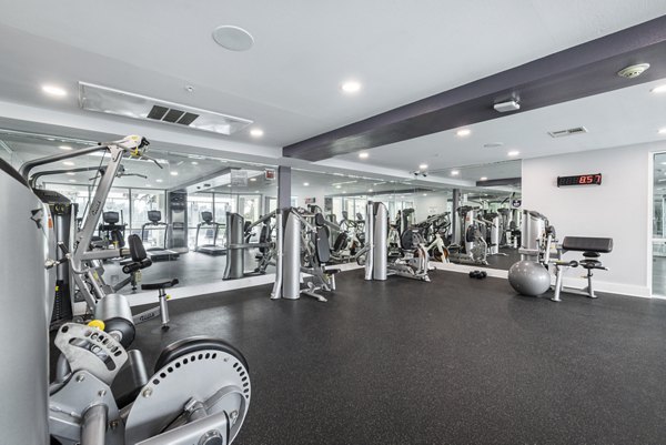 fitness center at St. Tropez Apartments Apartments