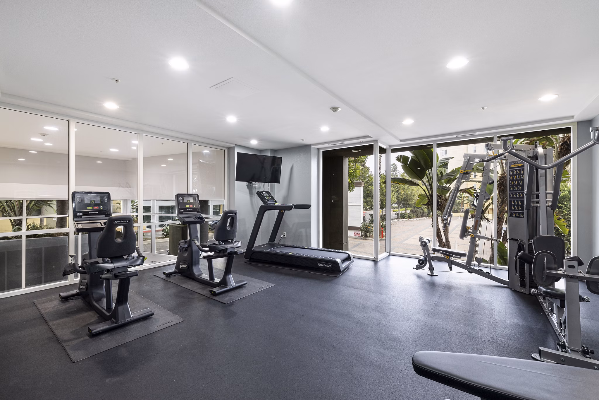 fitness center at St. Tropez Apartments Apartments