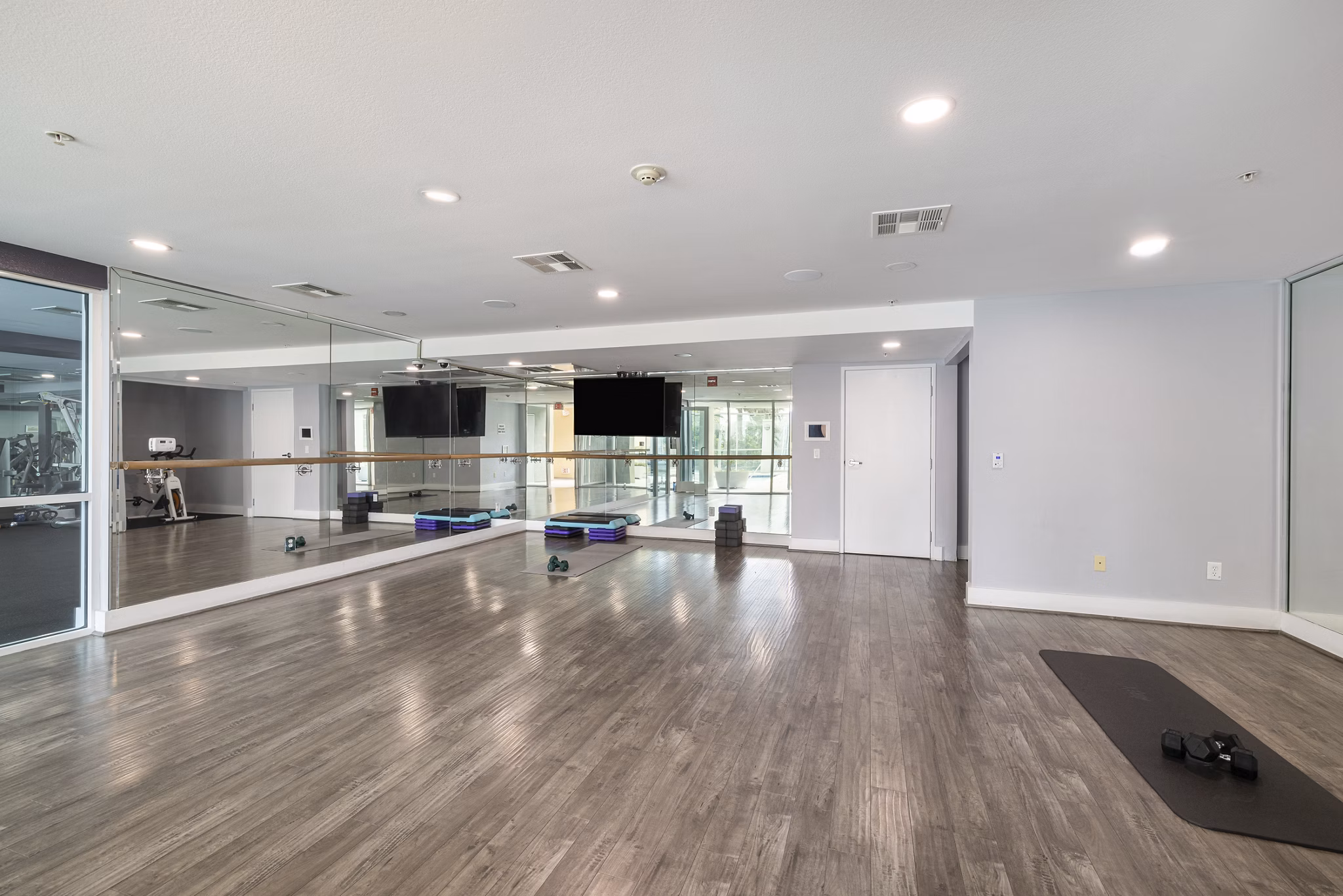 fitness center at St. Tropez Apartments Apartments