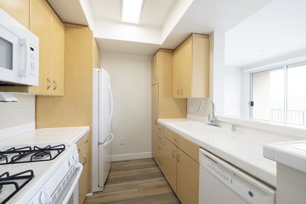 kitchen at St. Tropez Apartmentss Apartments