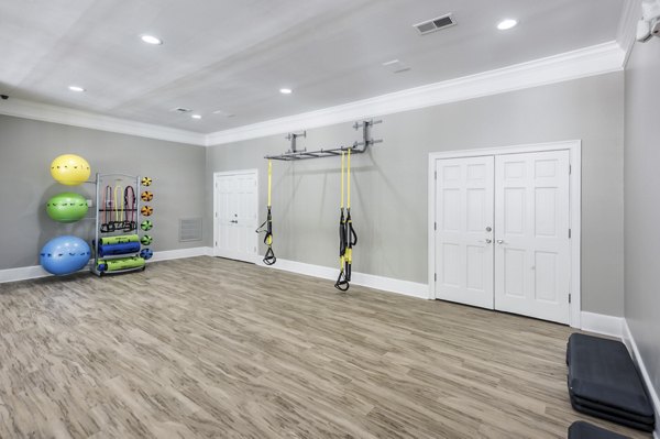 fitness center at The Lex at Brier Creek Apartments