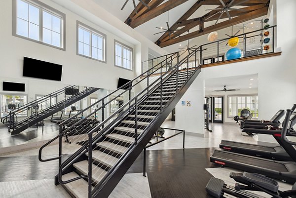fitness center at The Duke of Charleston Apartments