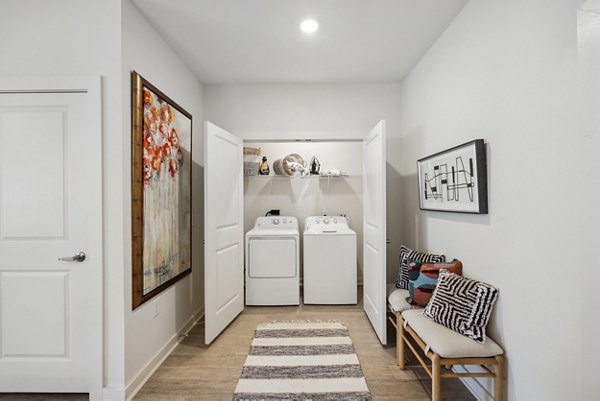 laundry room at The Duke of Charleston Apartments