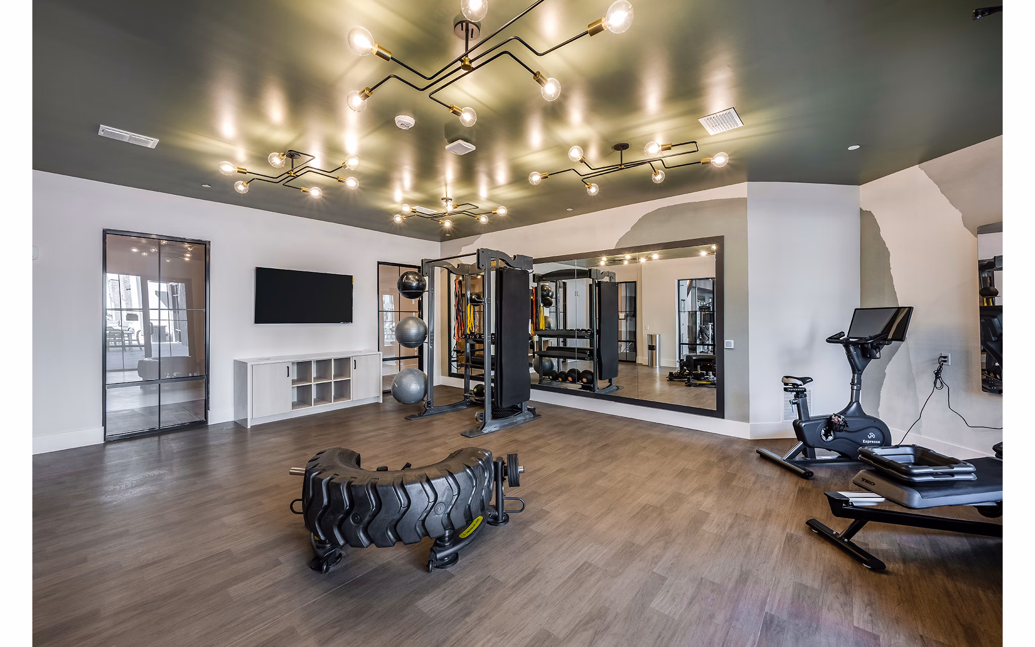 fitness center at The Allen Apartments