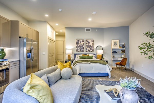living room at Alexan at the Galleria Apartments
