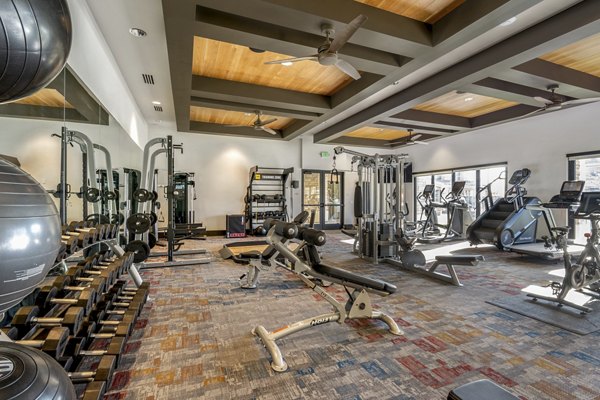 fitness center at The Charles Denver West Apartments