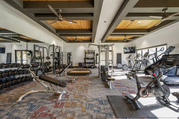 fitness center at The Charles Denver West Apartments