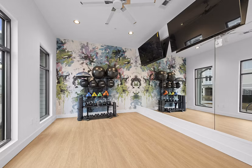 fitness center at Charlotte Exchange Apartments 