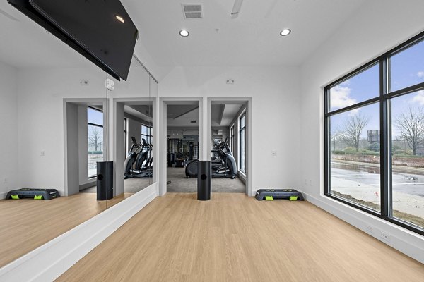 fitness center at Charlotte Exchange Apartments 