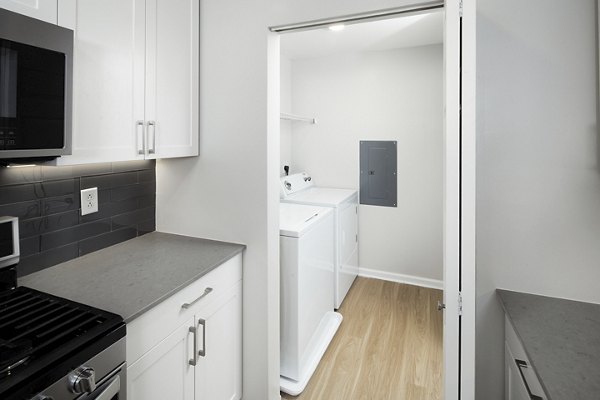 laundry room at Riverwood at New Canaan Apartments