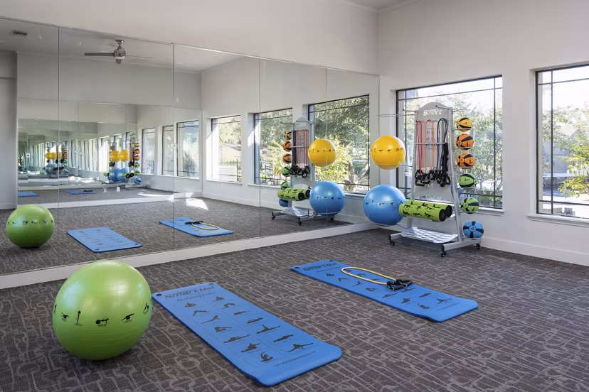 fitness center at Canyon Park Apartments