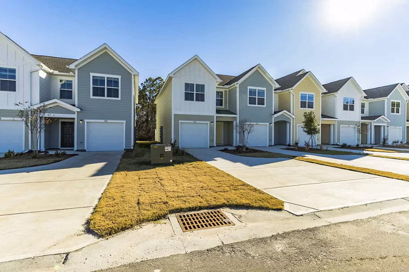 exterior at Covey Homes Grand Lagoon Apartments