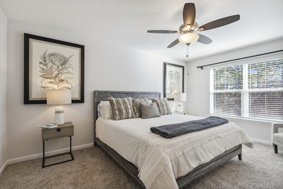 bedroom at Covey Homes Grand Lagoon Apartments