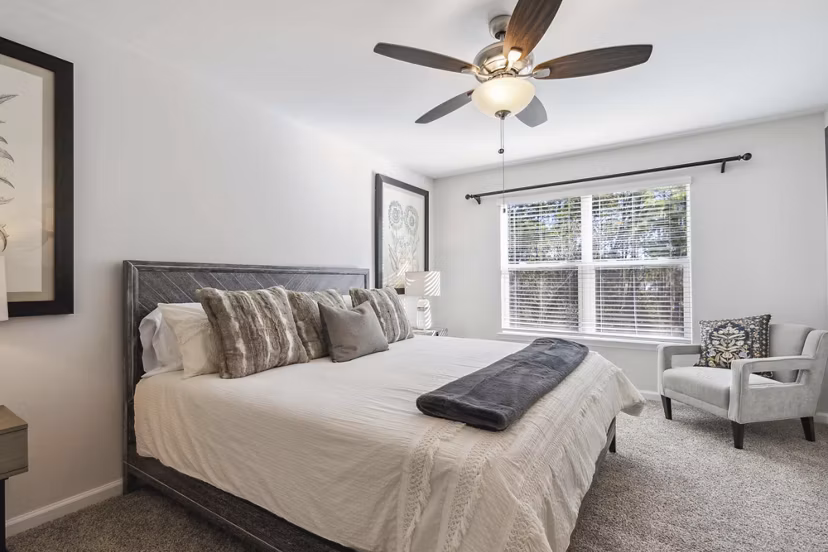 bedroom at Covey Homes Grand Lagoon Apartments
