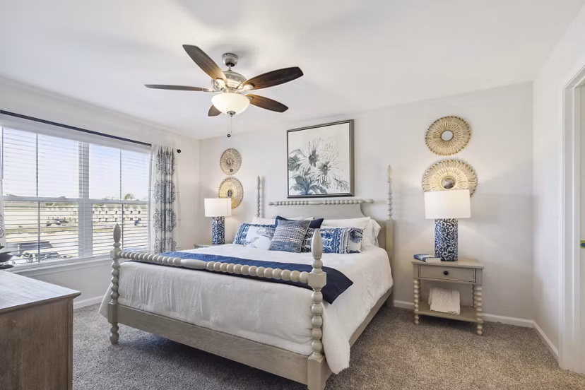 bedroom at Covey Homes Grand Lagoon Apartments