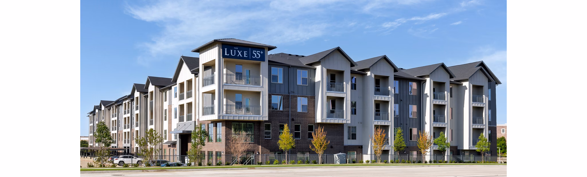 building at The Luxe at Lewisville Apartments