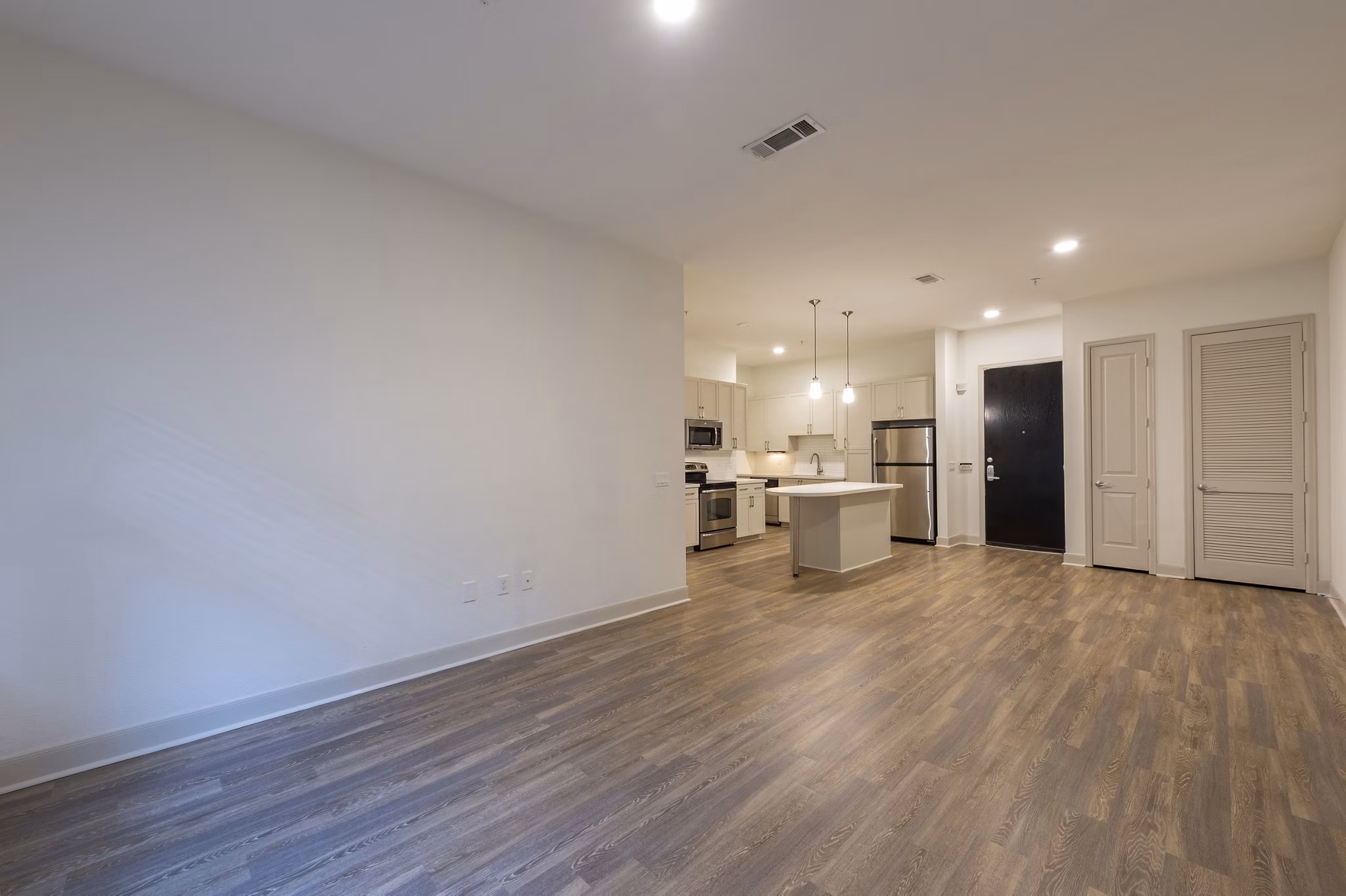living room at The Briscoe River Oaks Apartments