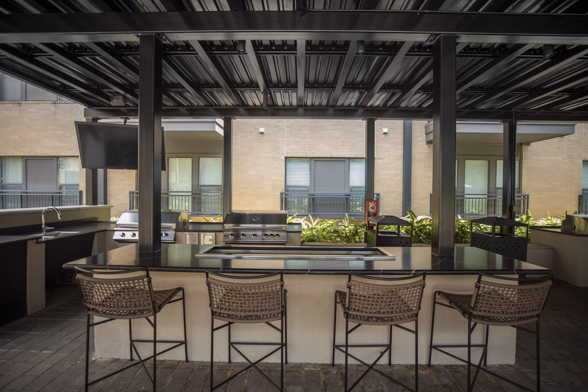 grill area at The Briscoe River Oaks Apartments