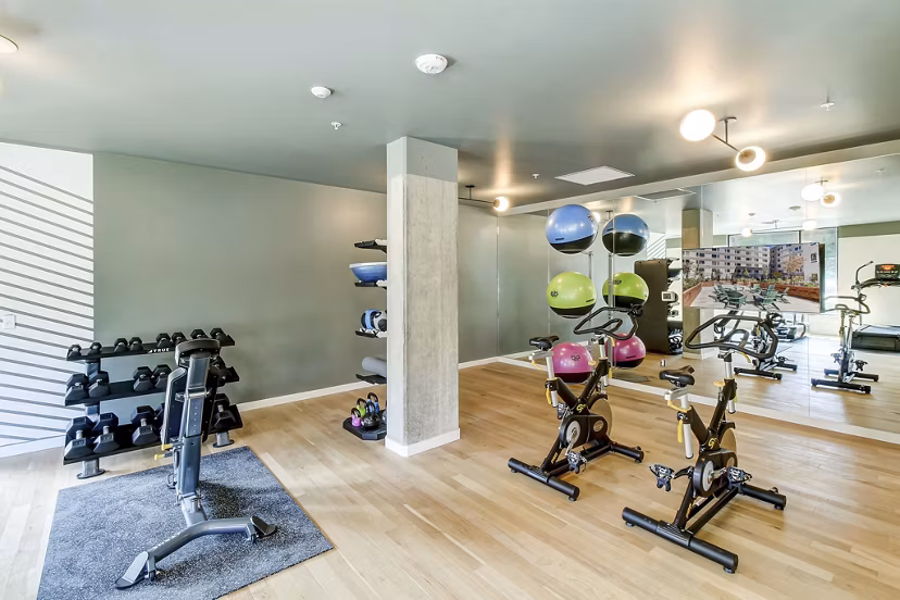 fitness center at Parkside Esterra Park Apartments