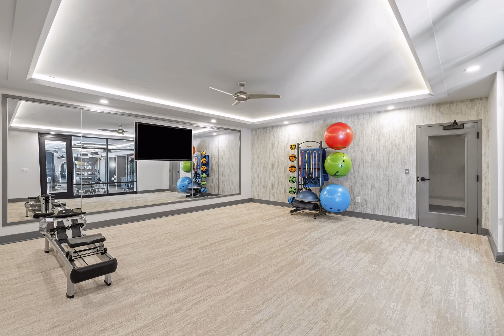 fitness center at The Parker Apartments
