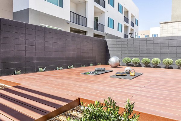 outdoor yoga and fitness center area at Marlowe South Las Vegas Apartments