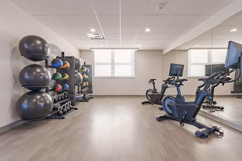 fitness center at Reflections Apartments