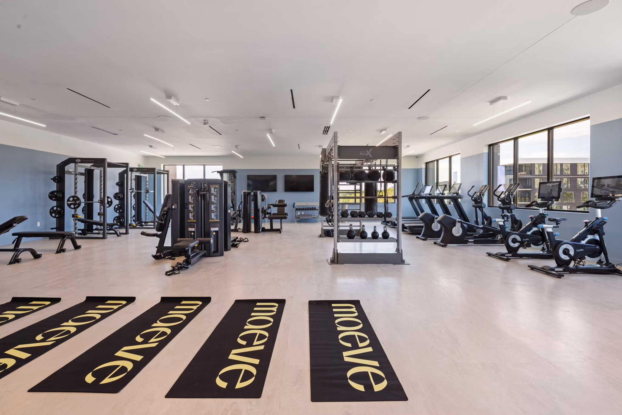 fitness center at Maeve Apartments