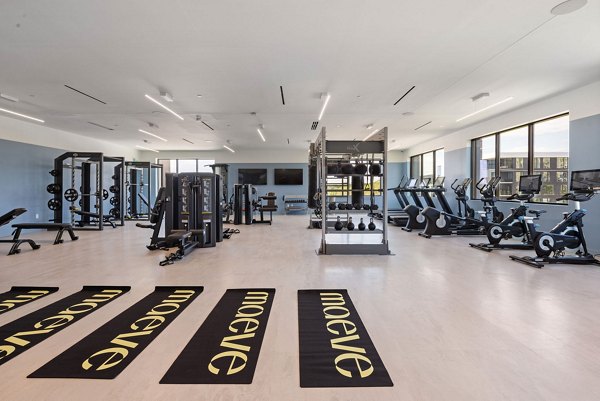 fitness center at Maeve Apartments