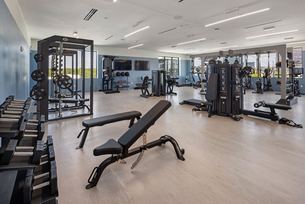 fitness center at Maeve Apartments