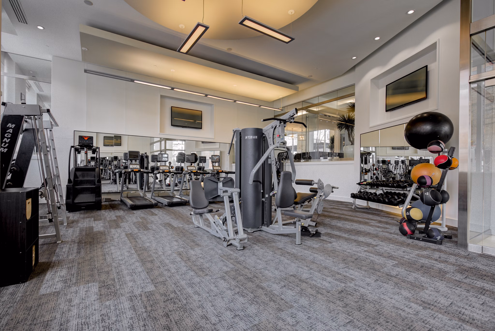 fitness center at The Porter Brewers Hill Apartments 