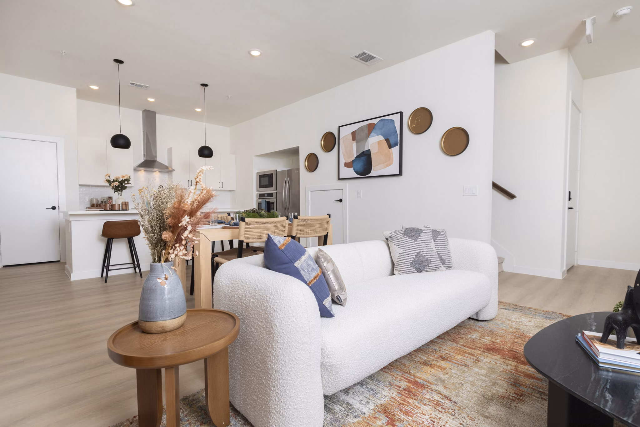 living room at Oasis at Woodland Apartments