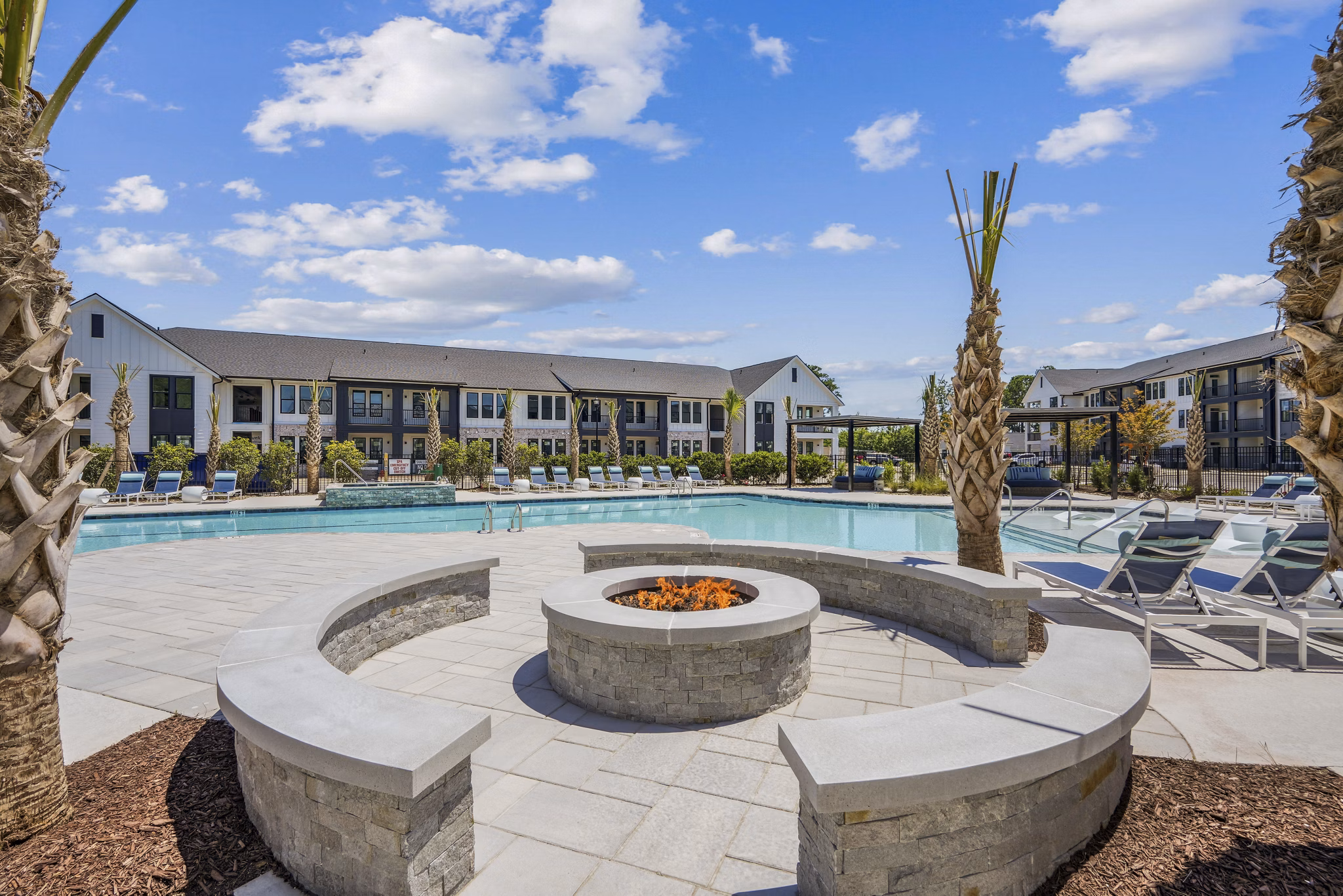 fire pit/patio/pool at Selene at Sayebrook Apartments