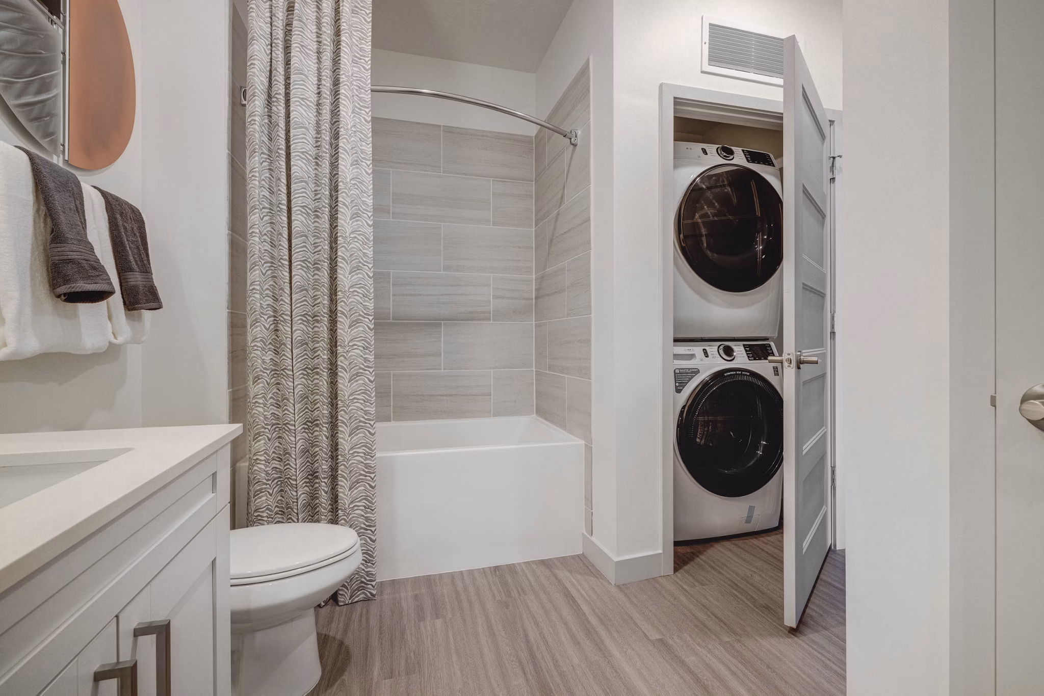 laundry room at Alta Stone at the Gateway Apartments