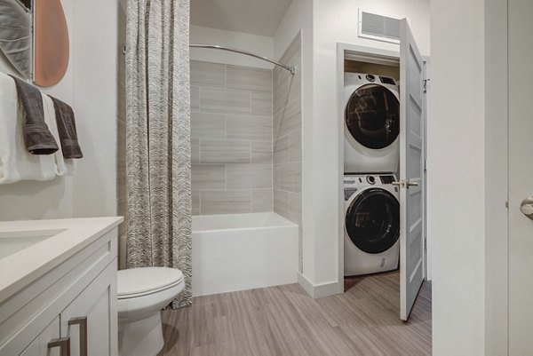 laundry room at Alta Stone at the Gateway Apartments