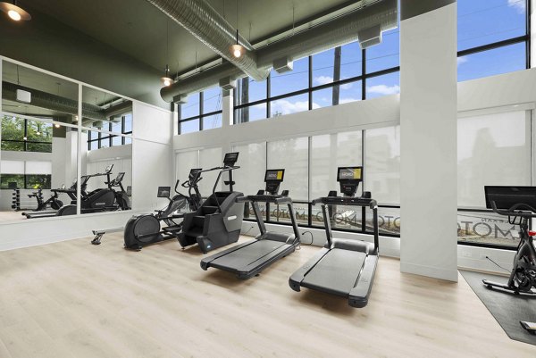fitness center at Alexan Moto Apartments