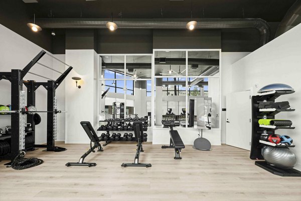 fitness center at Alexan Moto Apartments