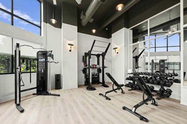 fitness center at Alexan Moto Apartments