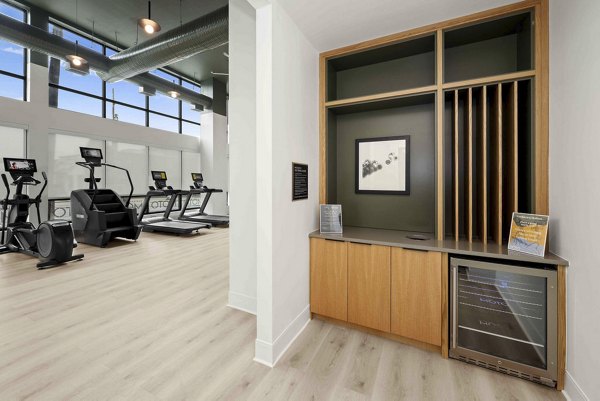 fitness center at Alexan Moto Apartments