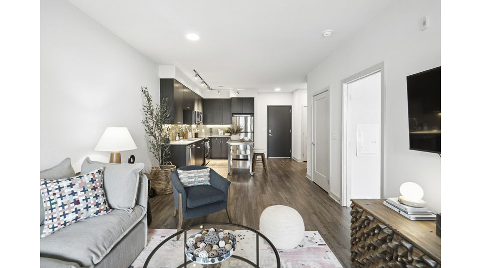 living room at The Daley at Shady Grove Apartments