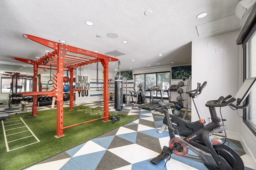 fitness center at Courtney Park Apartments 