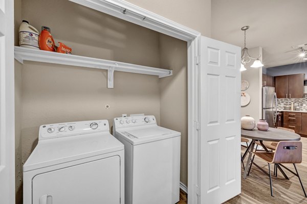 laundry room at Wiregrass at Stone Oak Apartments