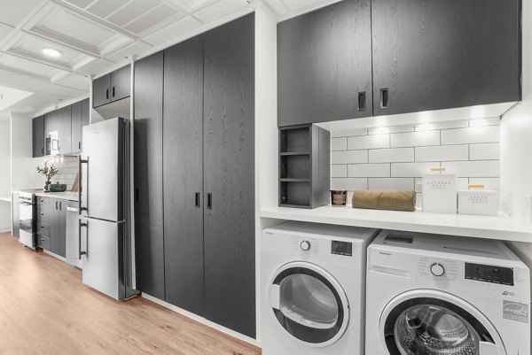 laundry facility at FUZE Woodstock Apartments