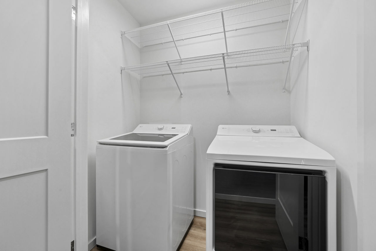 Laundry room at The Seventeen Hundred On East Apartments