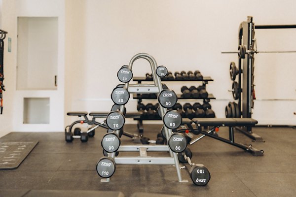 fitness center at TENTEN Campus Glendale Apartments 