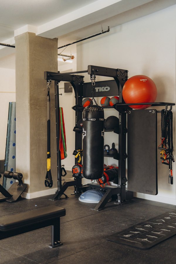 fitness center at TENTEN Campus Glendale Apartments 