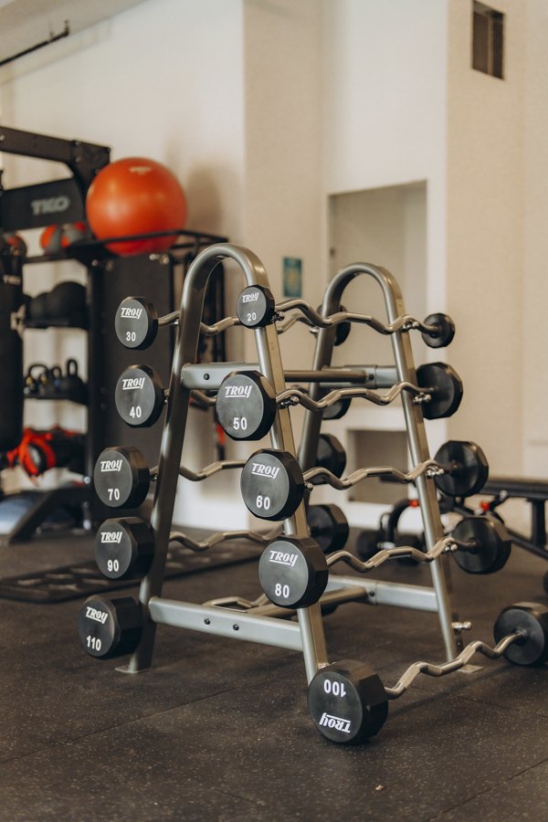 fitness center at TENTEN Campus Glendale Apartments 